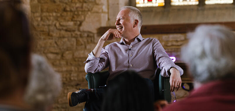 Tim Relf at a poetry recital. Copyright William Blakesley-Herbert Tim Relf at a poetry reading